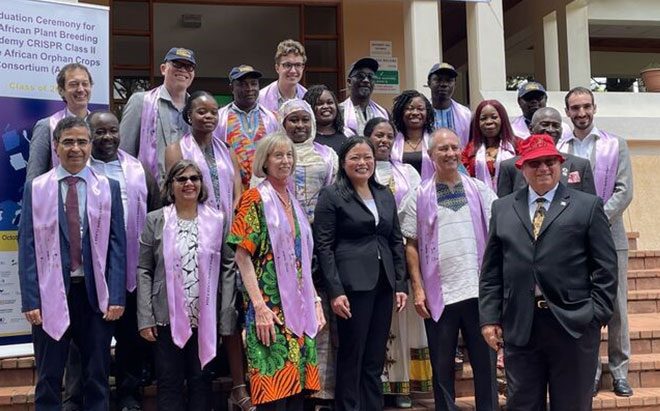Graduates of the CRISPR Course during the procession CRISPR Course cohort with instructors at the graduation ceremony.
